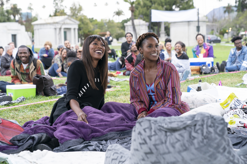 Yvonne Orji (left), Issa Rae